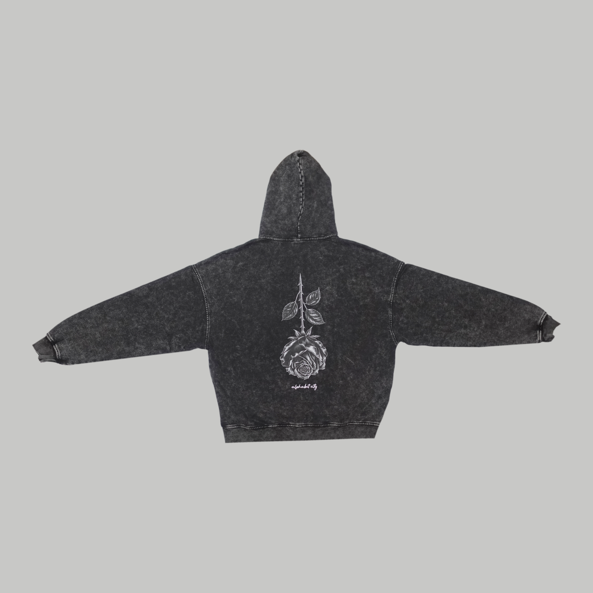 Back photograph of the BLACK ROSE Hoodie with sleeves spread to show the full silhouette and back artwork.