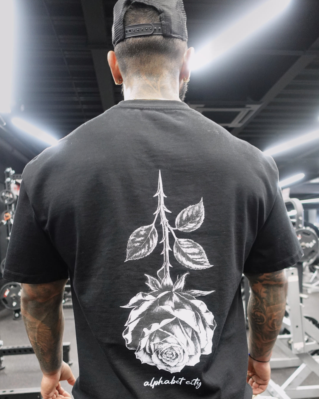 David wearing BLACK ROSE Tee, alternate fit view.