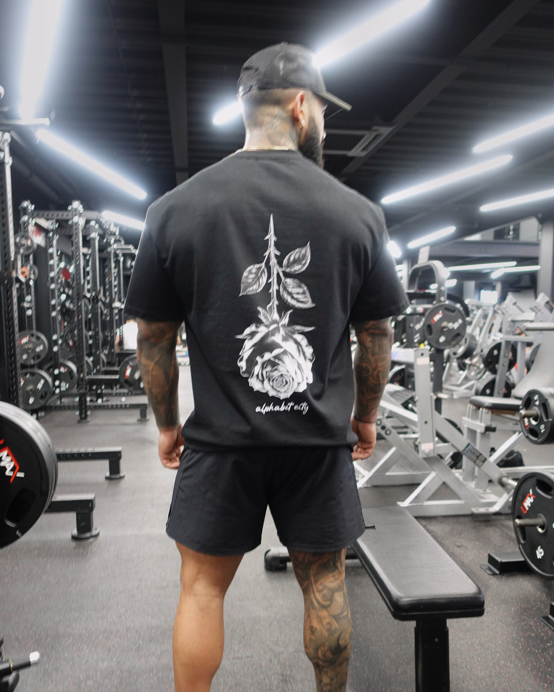 David wearing BLACK ROSE Tee, alternate fit view.