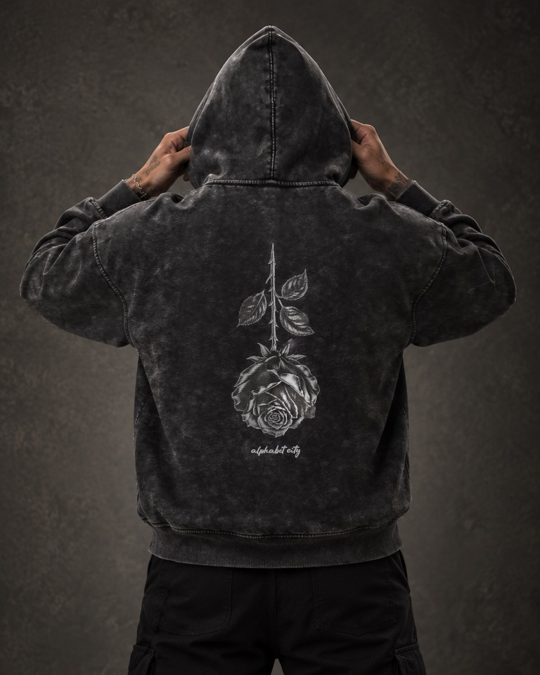 Back view of BLACK ROSE Hoodie with the hood up and hands beside the hood.