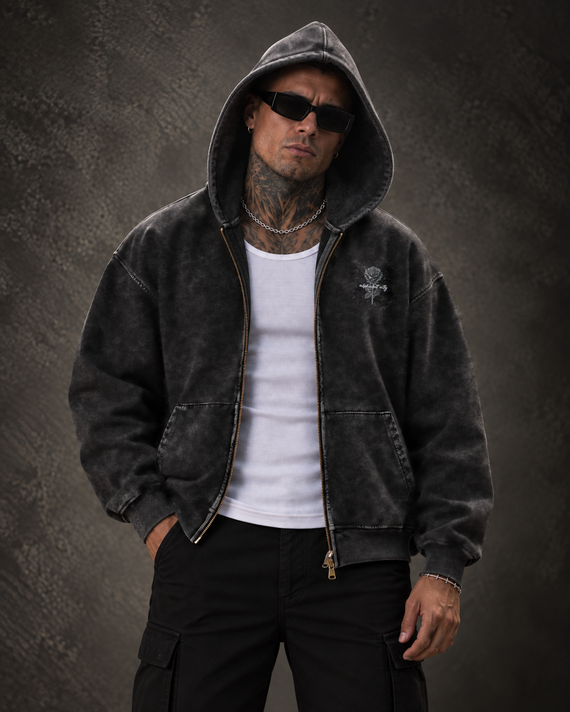 Front view of BLACK ROSE Hoodie with the hood up and zipper open over a white tank top.
