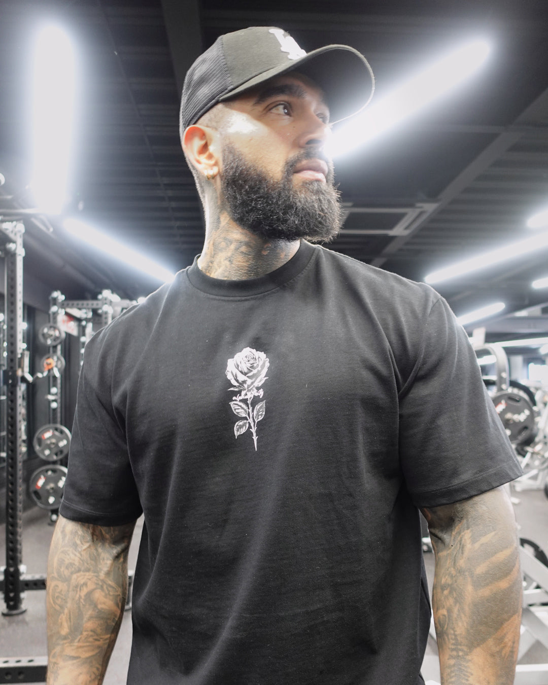 David wearing BLACK ROSE Tee, alternate fit view.