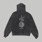 Back photograph of the BLACK ROSE Hoodie, showing the large inverted rose and ALPHABET CITY lettering.
