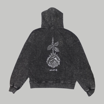 Back photograph of the BLACK ROSE Hoodie, showing the large inverted rose and ALPHABET CITY lettering.