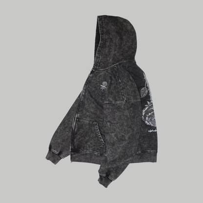 Side photograph of the BLACK ROSE Hoodie, showing the hood, shoulder, sleeve and garment depth.