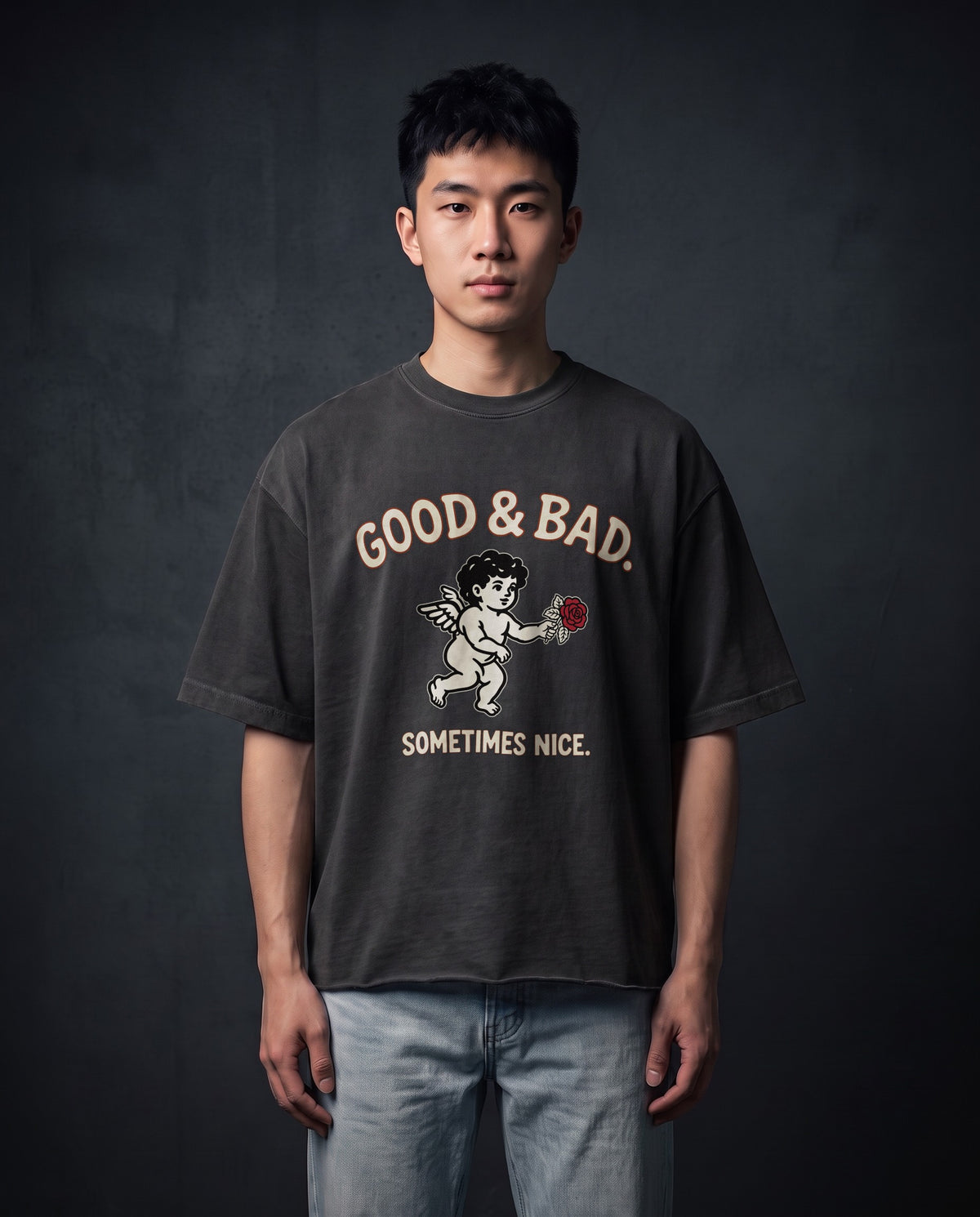 Model wearing the Good&Bad Cotton Tee in Faded Black, front view