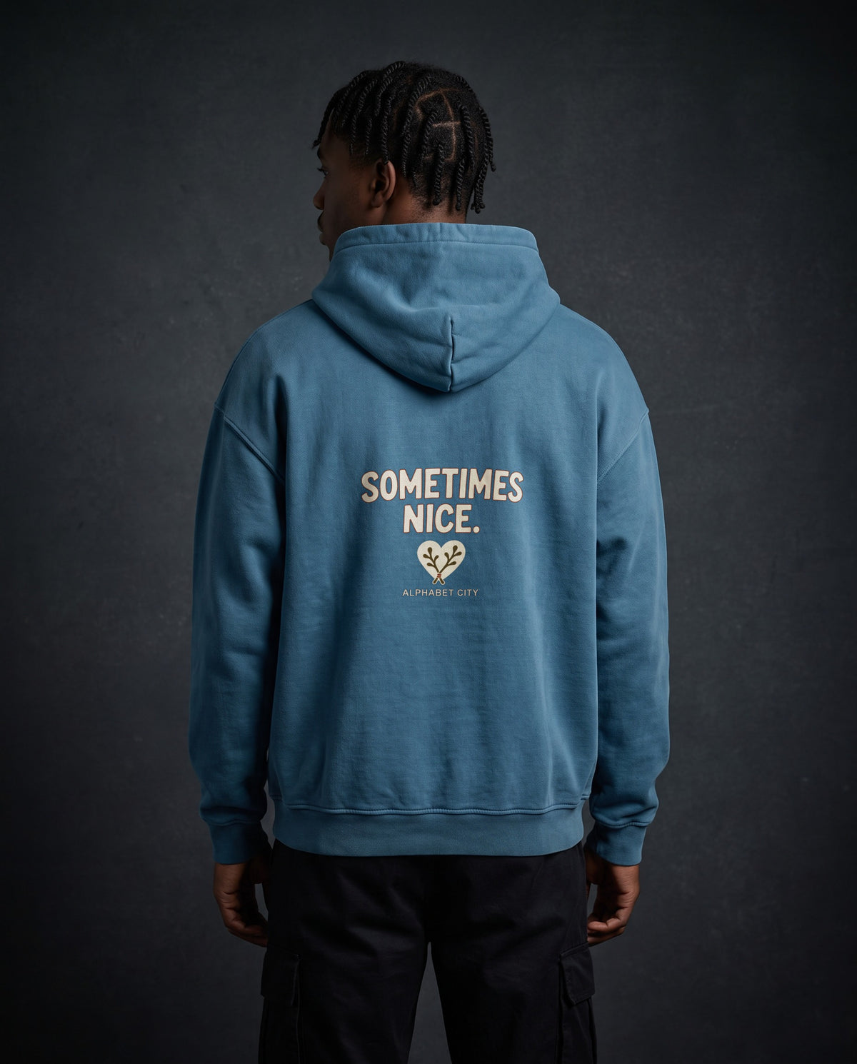 Model wearing the Good&Bad Heavyweight Pullover Hoodie in Kashmir Blue, back view