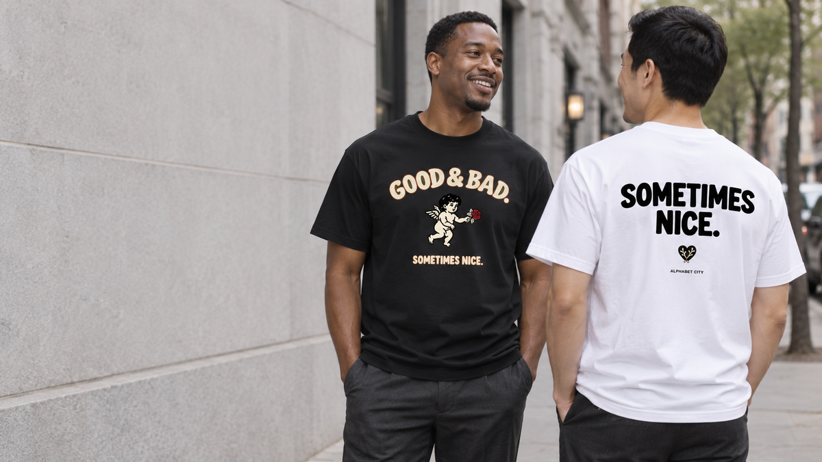 Good&amp;Bad sometimes Nice — black Tee front and white Tee back on a New York street.