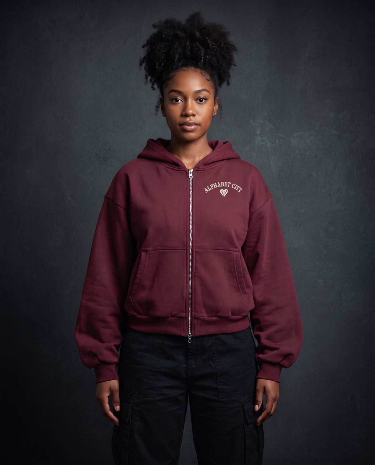 Model wearing the Heart Zip Hoodie in Red, front view