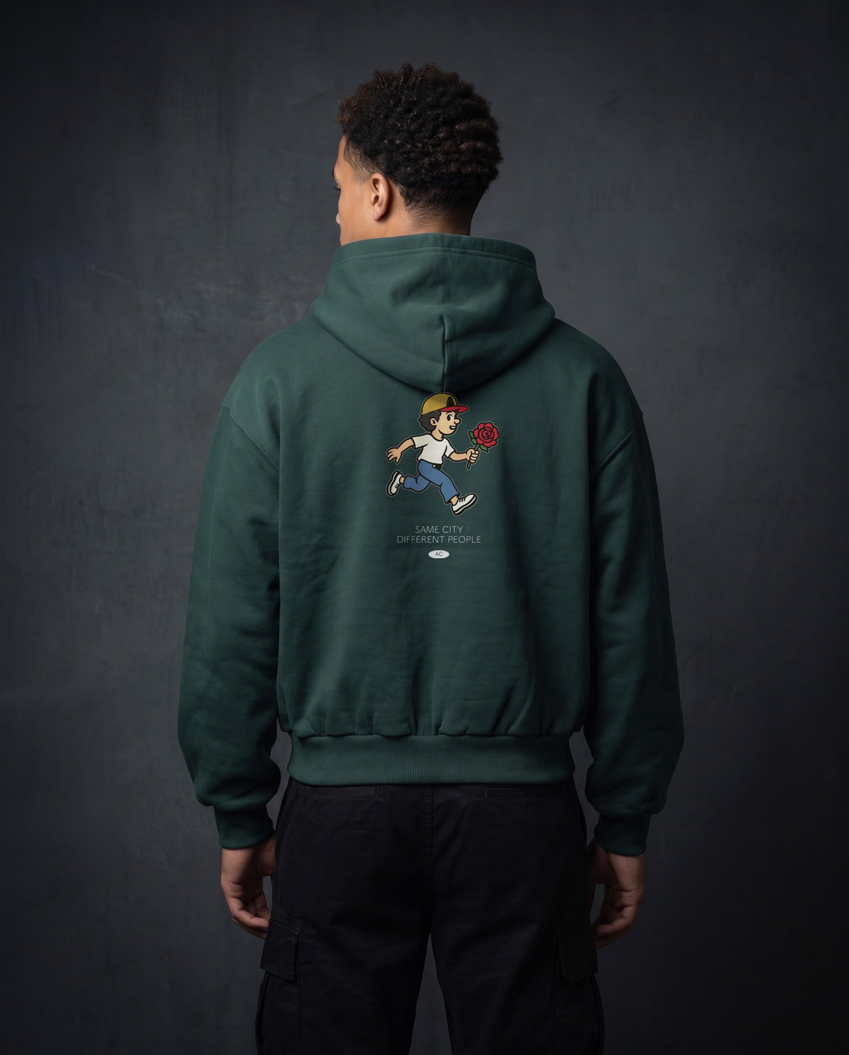 Model wearing the Rose Runner Zip Hoodie in Green, back view