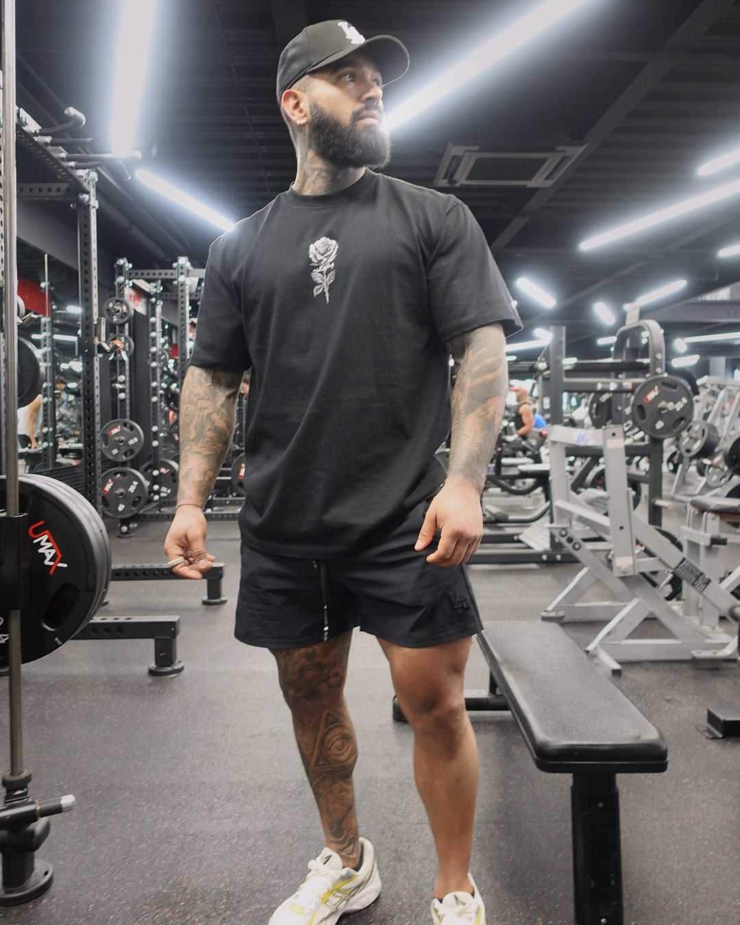 David wearing BLACK ROSE Tee in a gym.