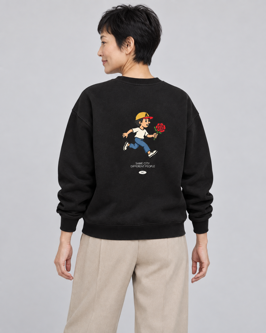 Rose Runner Sweatshirt in Black — model back, AI-assisted digital mockup