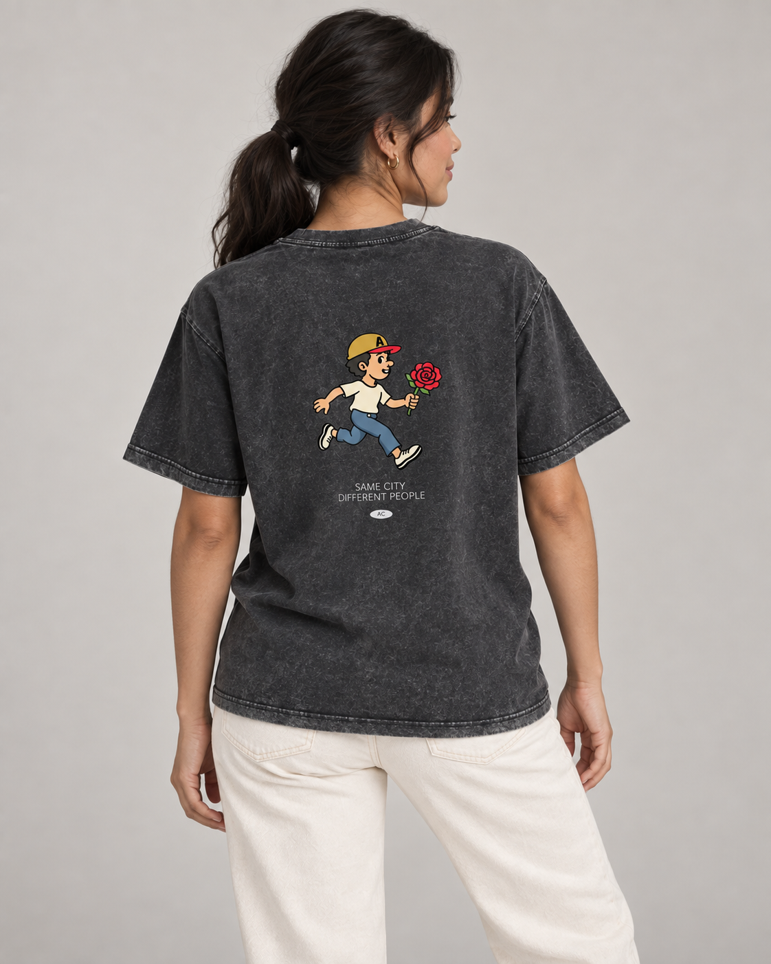 Rose Runner Washed Tee in Black — model back, AI-assisted digital mockup